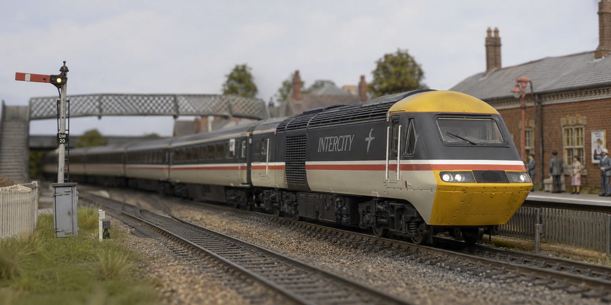 InterCity HST power car passing a station with a semaphore signal, OO gauge model railway