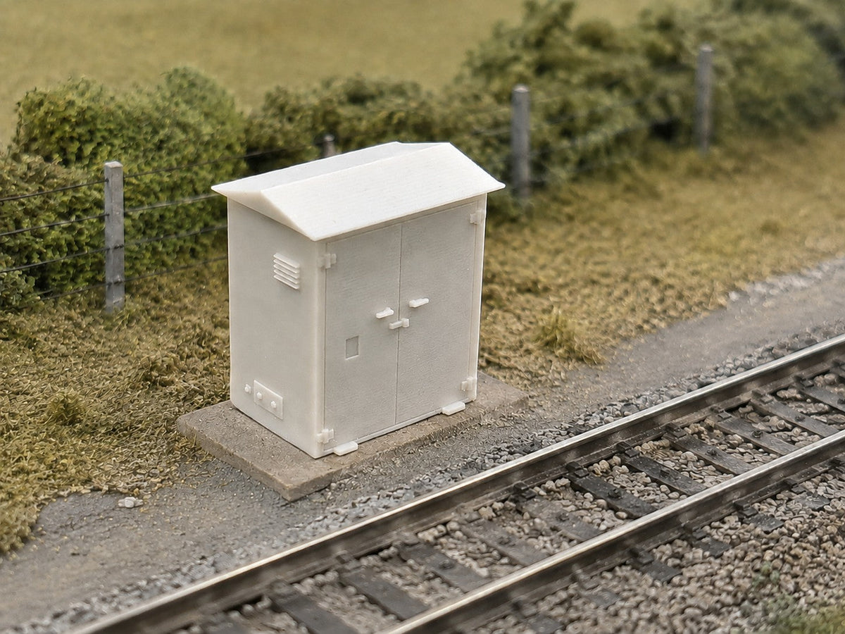 OO gauge lineside electrical cabinet in a trackside scene beside the running line